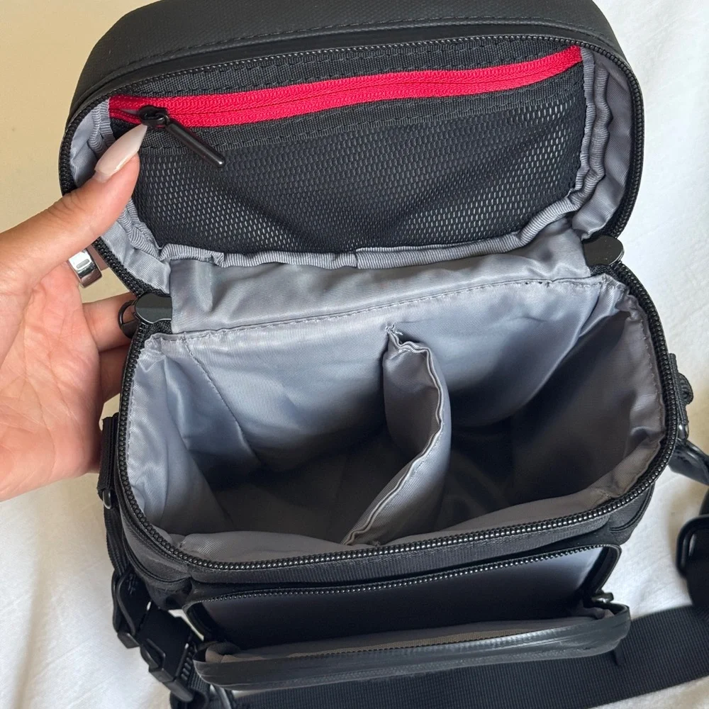 DJI Mavic Black Messenger Bag with Adjustable Strap and Minimalist Design